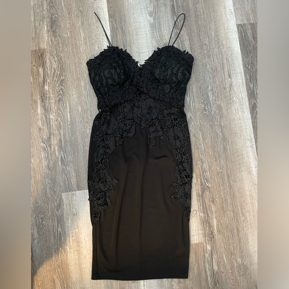 Aqua XS black bodycon midi dress with lavender detailing from Bloomingdale’s